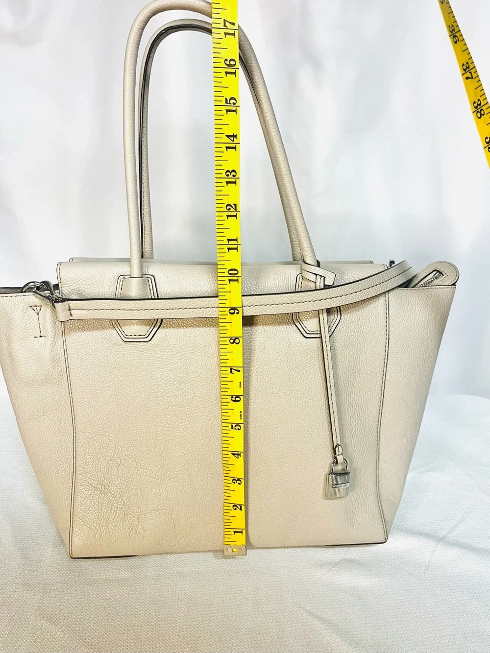 Michael Kors Pebble Leather Beige Cream Tote with Lock Charm - Picture 15 of 16
